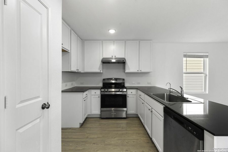 Furnished interior view inside a new home in Presa Point, San Antonio (Image 7).