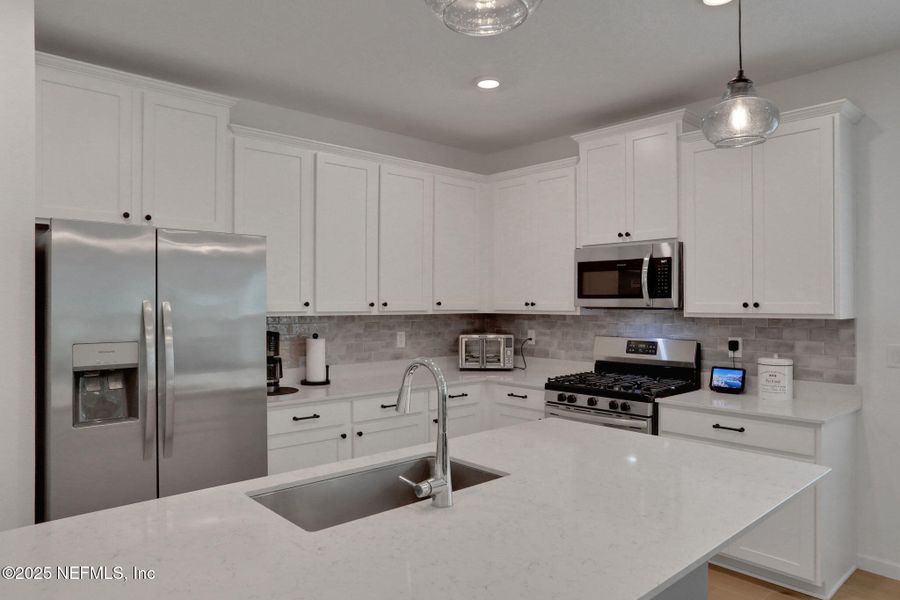 Furnished interior view inside a new home in Tributary: Lakeview at Tributary 50's, Yulee (Image 4).