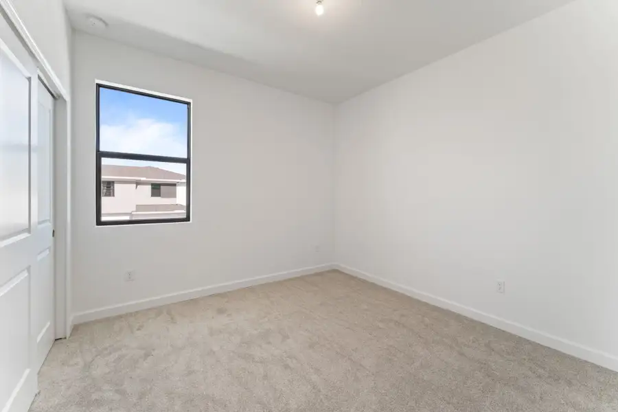 Spacious, unfurnished interior of a new home in Tradition, Port St. Lucie (Image 9). Spacious, unfurnished interior of a new home in Tradition, Port St. Lucie (Image 9).
