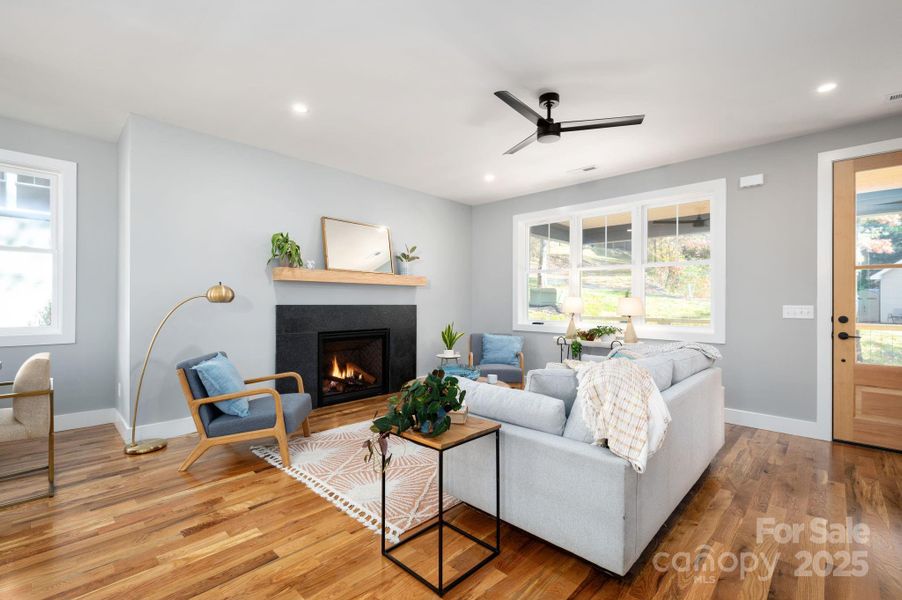 Living Room with Leathered Granite Surround Gas Fireplace