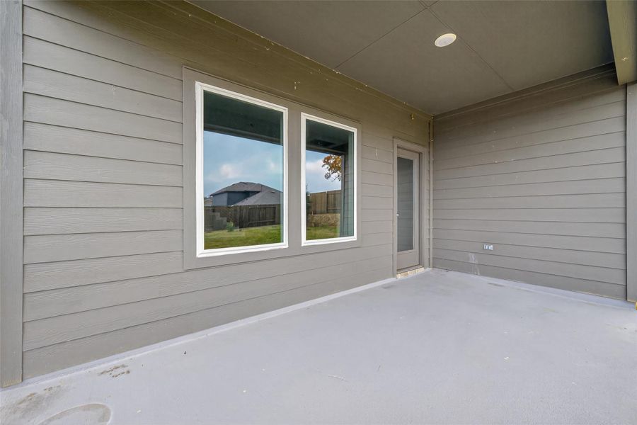 Exterior details and patio area of a home in Water Crest on Lake Conroe, Conroe (Image 28).