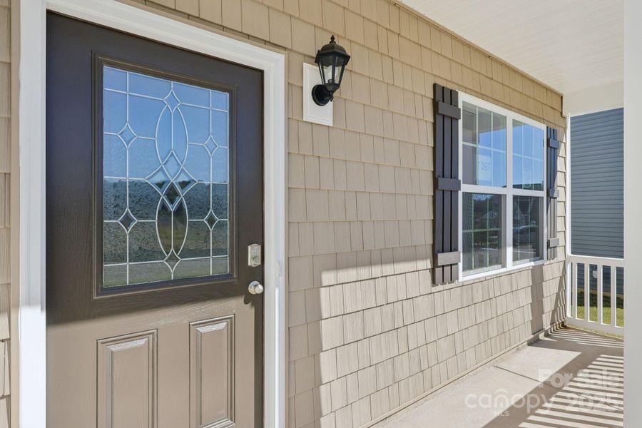 Exterior details and patio area of a home in Cline Village, Conover (Image 2).