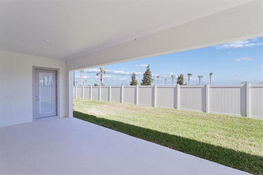 Exterior details and patio area of a home in Oakfield, Parrish (Image 4).