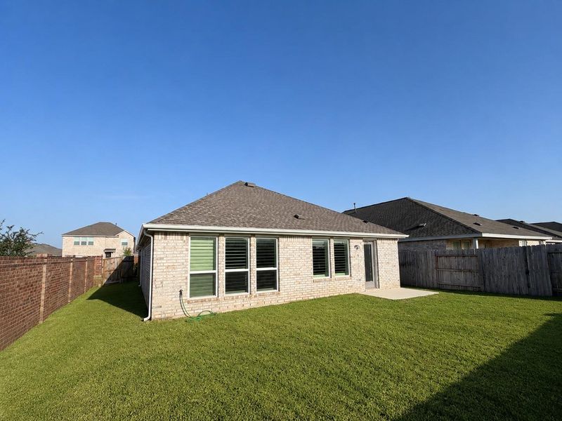 Exterior details and patio area of a home in , Katy (Image 25).
