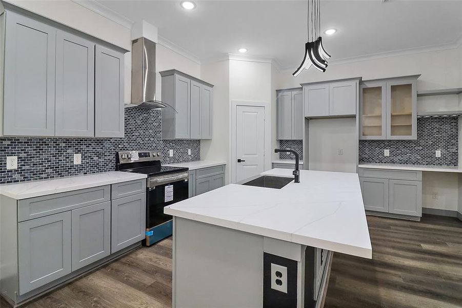 The kitchen's layout is both functional and inviting, with ample counter space adorned in luxurious quartz countertops that provide plenty of room for food preparation and serving.