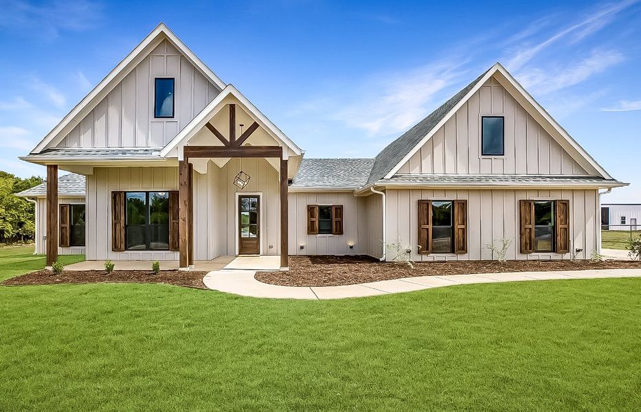 Representative exterior photo of a completed home built from the Dallington by Trinity Classic Homes in Zion Trails, Poolville, TX (Image 1). Representative exterior photo of a completed home built from the Dallington by Trinity Classic Homes in Zion Trails, Poolville, TX (Image 1).
