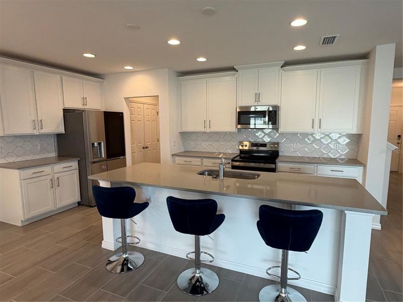 Furnished interior view inside a new home in , Davenport (Image 5).