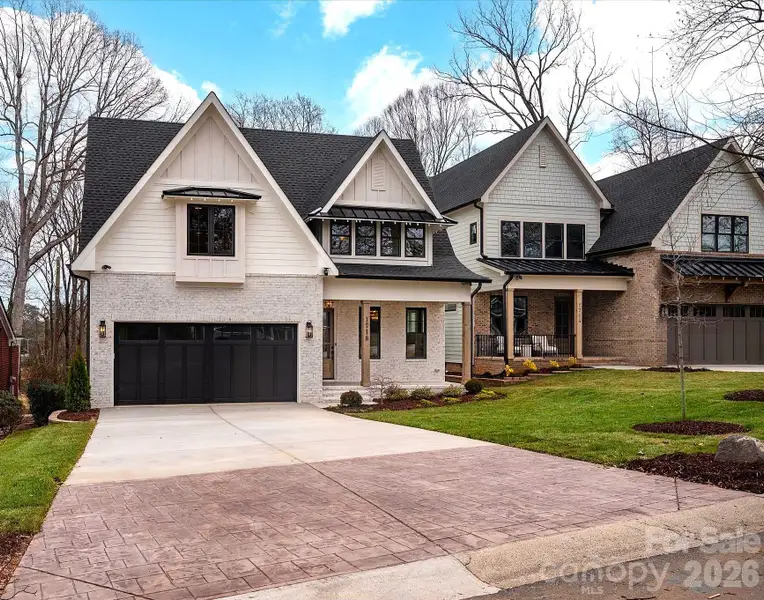 Front exterior of a new home in , Charlotte, NC, highlighting curb appeal (Image 2). Front exterior of a new home in , Charlotte, NC, highlighting curb appeal (Image 2).