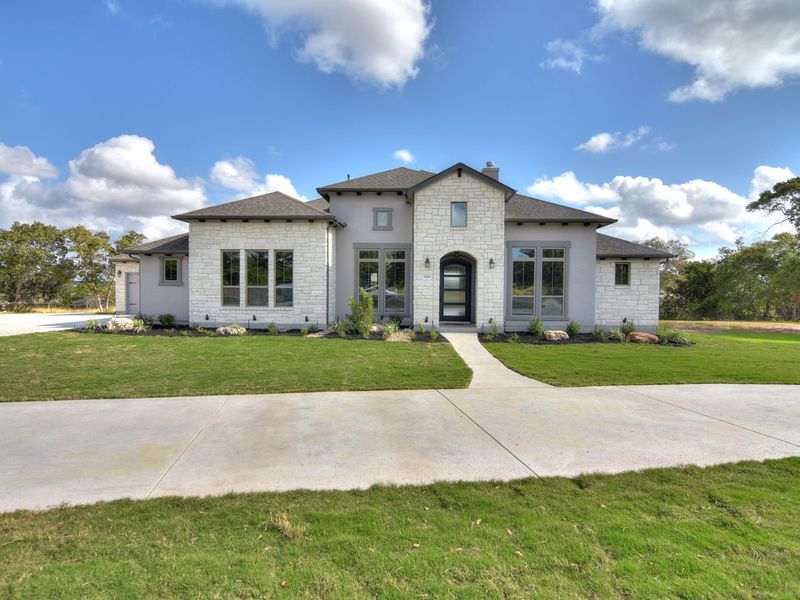Representative exterior photo of a completed home built from the Avalon by Giddens Homes in Scofield Farms Estates, Georgetown, TX (Image 26).