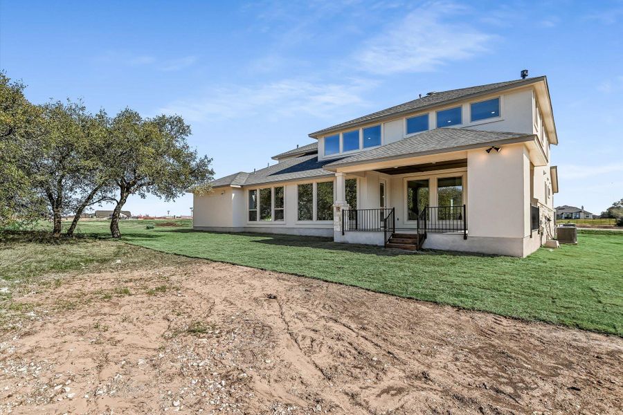 Exterior details and patio area of a home in Leander Estates, Leander (Image 4).