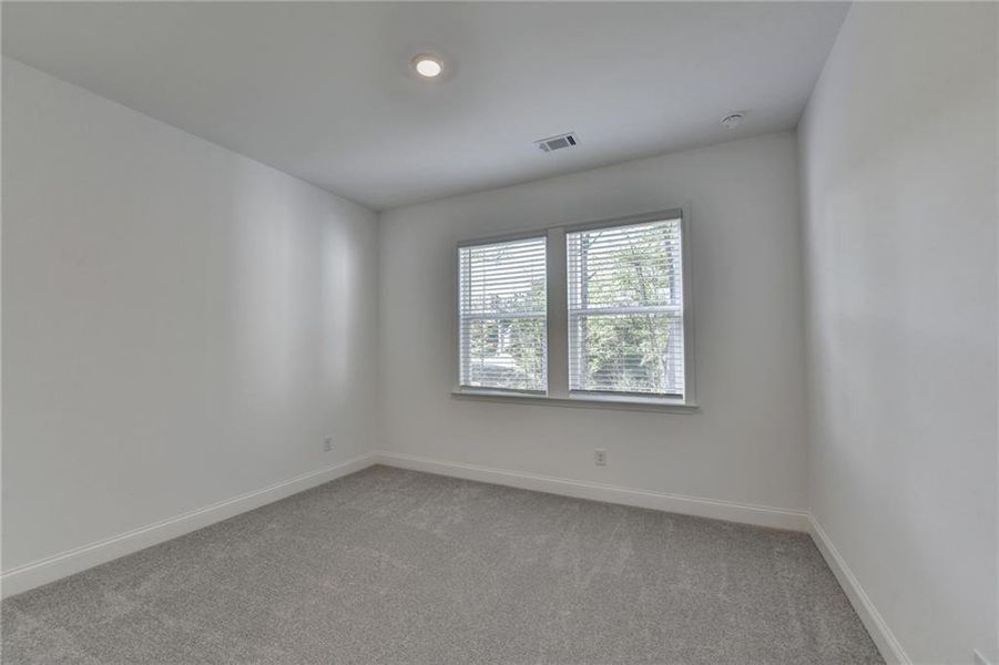 Spacious, unfurnished interior of a new home in Bailey Fence, Dacula (Image 64).