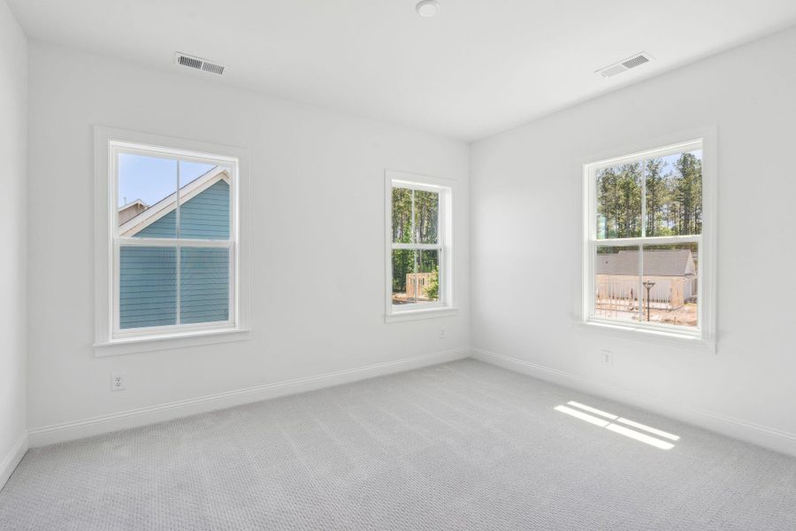 Spacious, unfurnished interior of a new home in The Domus Collection at Midtown Nexton, Summerville (Image 37).