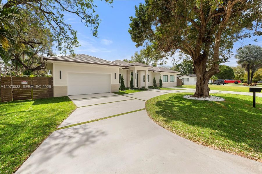 Front exterior of a new home in , Miami, FL, highlighting curb appeal (Image 2). Front exterior of a new home in , Miami, FL, highlighting curb appeal (Image 2).