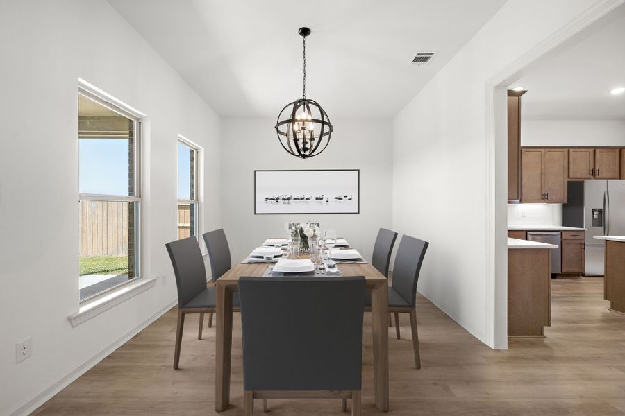 Front exterior of a new home in Emberly 55, Beasley, TX, highlighting curb appeal (Image 2). Front exterior of a new home in Emberly 55, Beasley, TX, highlighting curb appeal (Image 2).