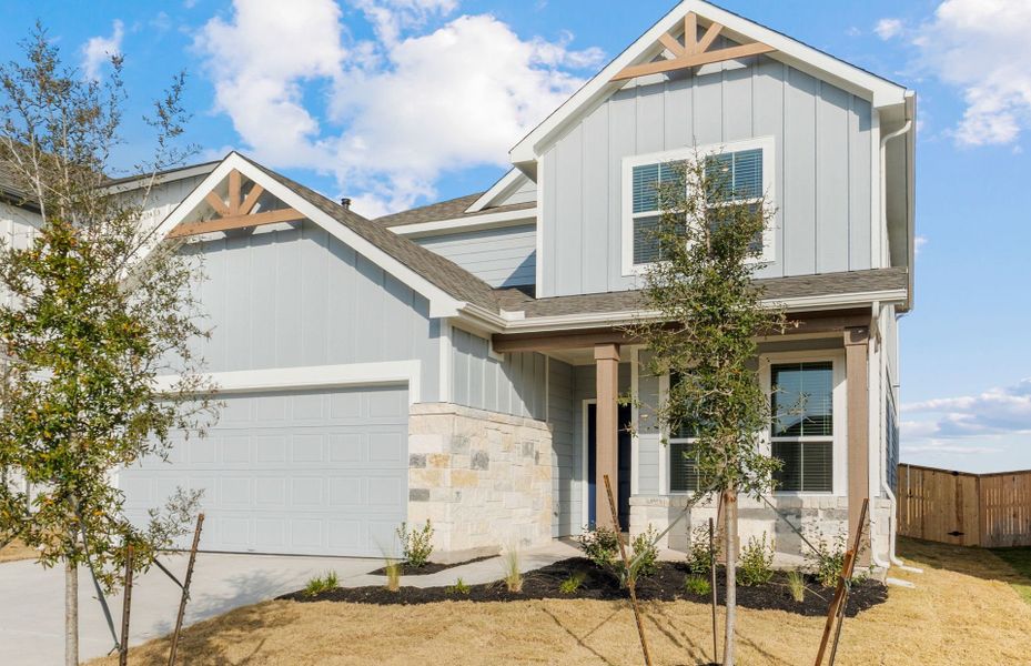 Front exterior of a new home in Patterson Ranch, Georgetown, TX, highlighting curb appeal (Image 21).