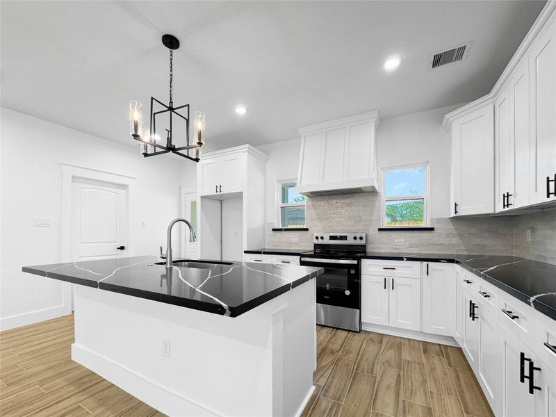 Kitchen with Quartz Countertops and soft closing cabinets Kitchen with Quartz Countertops and soft closing cabinets