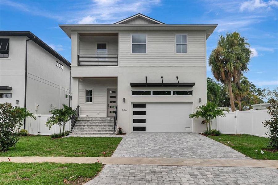 Front exterior of a new home in , Tampa, FL, highlighting curb appeal (Image 25). Front exterior of a new home in , Tampa, FL, highlighting curb appeal (Image 25).