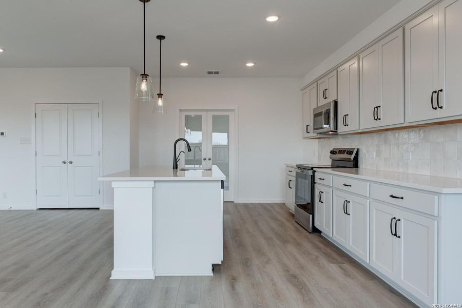 Furnished interior view inside a new home in Hennersby Hollow, San Antonio (Image 11). Furnished interior view inside a new home in Hennersby Hollow, San Antonio (Image 11).