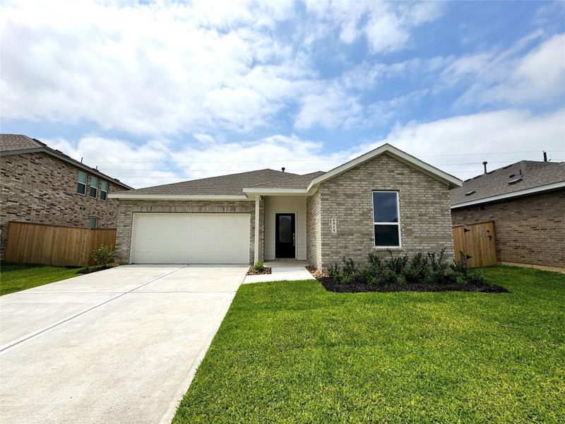 Front exterior of a new home in Anniston, Katy, TX, highlighting curb appeal (Image 20).