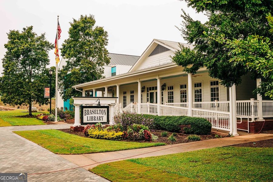 Front exterior of a new home in Rosewood Lake Estates, Hoschton, GA, highlighting curb appeal (Image 28).