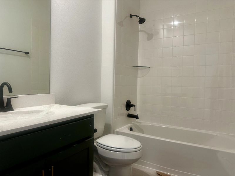 Furnished interior view inside a new home in Sunterra, Katy (Image 5).