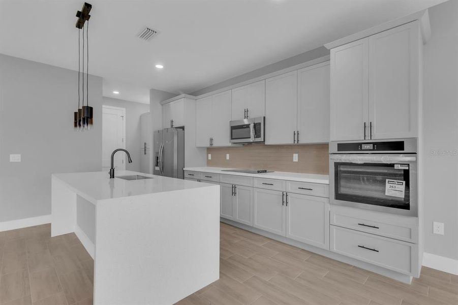 Furnished interior view inside a new home in , Palm Bay (Image 5). Furnished interior view inside a new home in , Palm Bay (Image 5).