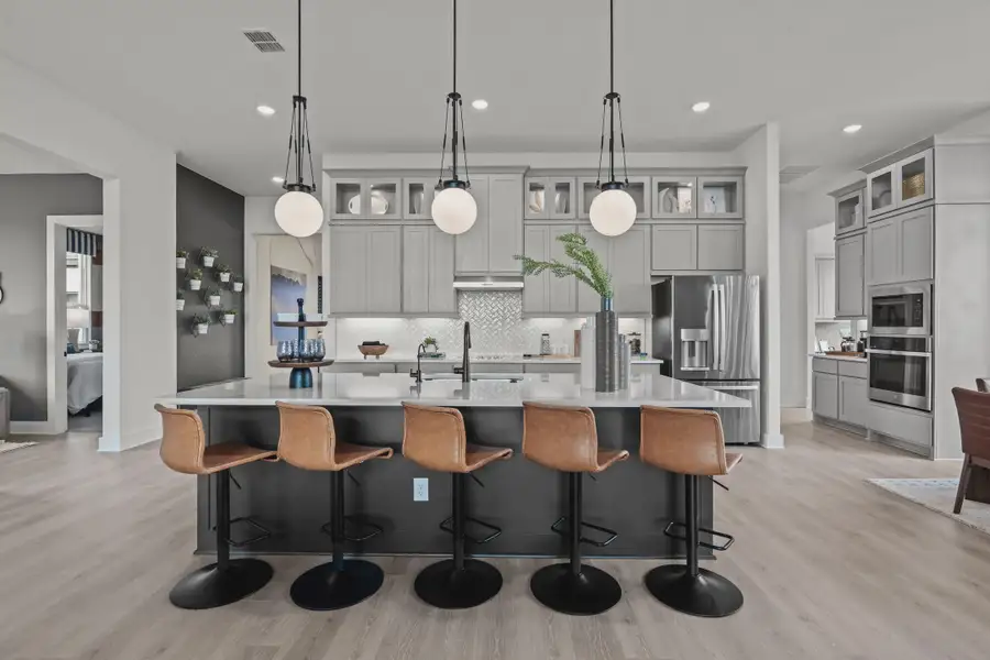 Representative furnished interior of a home built from the Silas by Chesmar Homes in Esperanza 60's, Boerne (Image 3).