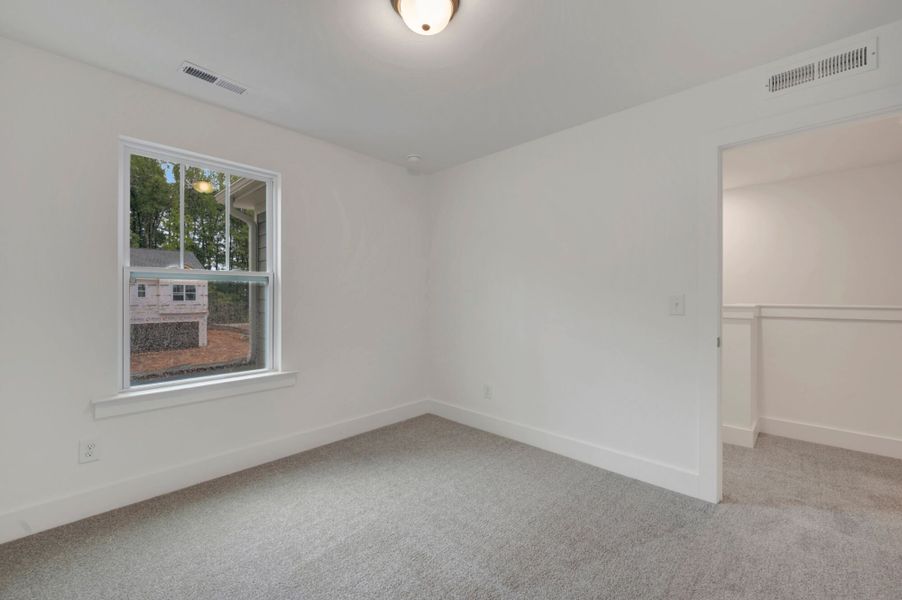 Spacious, unfurnished interior of a new home in Ashmore Townes, Garner (Image 23). Spacious, unfurnished interior of a new home in Ashmore Townes, Garner (Image 23).