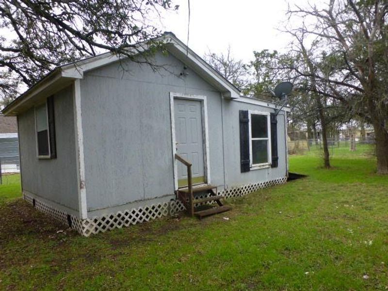 Exterior details and patio area of a home in , Willow Park (Image 2). Exterior details and patio area of a home in , Willow Park (Image 2).
