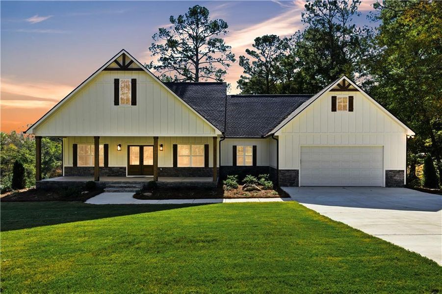 Front exterior of a new home in , Dallas, GA, highlighting curb appeal (Image 1).