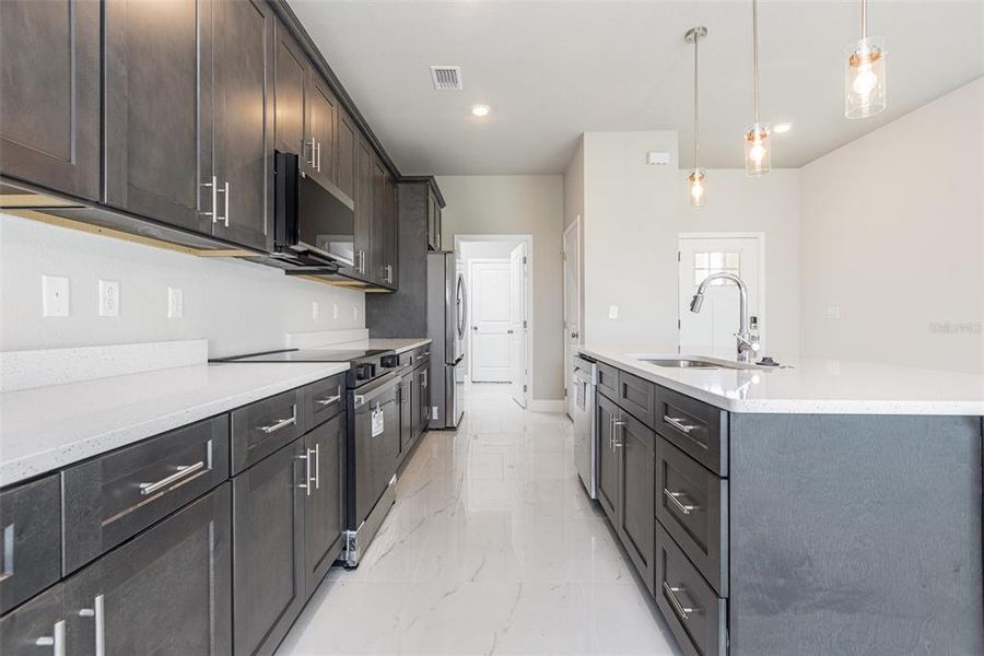 Furnished interior view inside a new home in , Port Charlotte (Image 9).