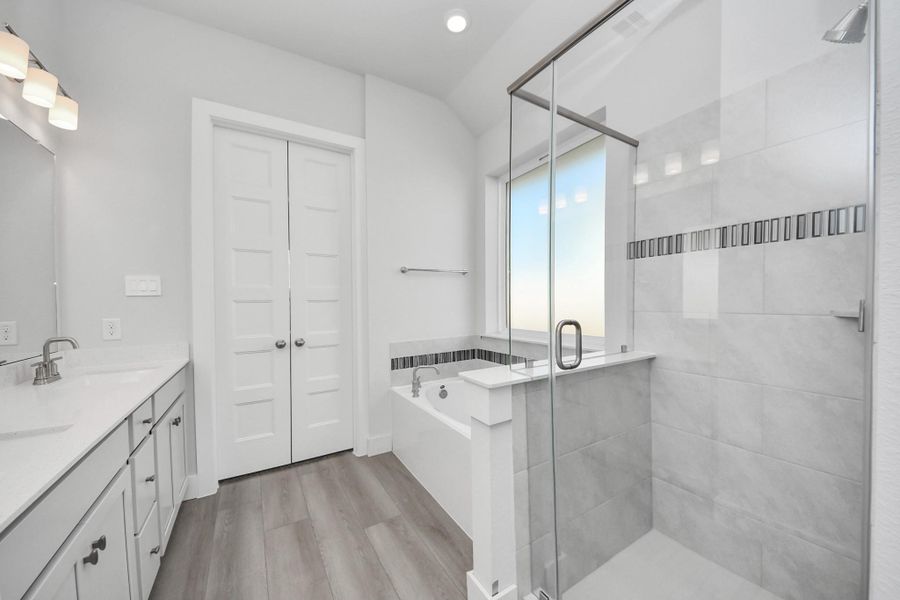 Furnished interior view inside a new home in Sunterra: Premier Collection, Katy (Image 4).