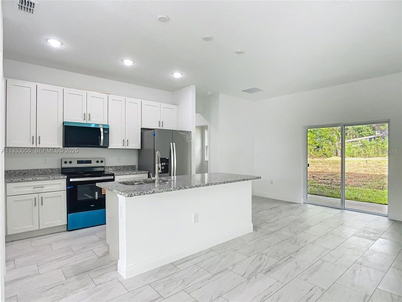 Furnished interior view inside a new home in , Citrus Springs (Image 3).