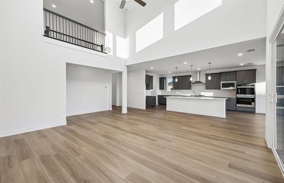 View of main living areas with two-story ceilings View of main living areas with two-story ceilings