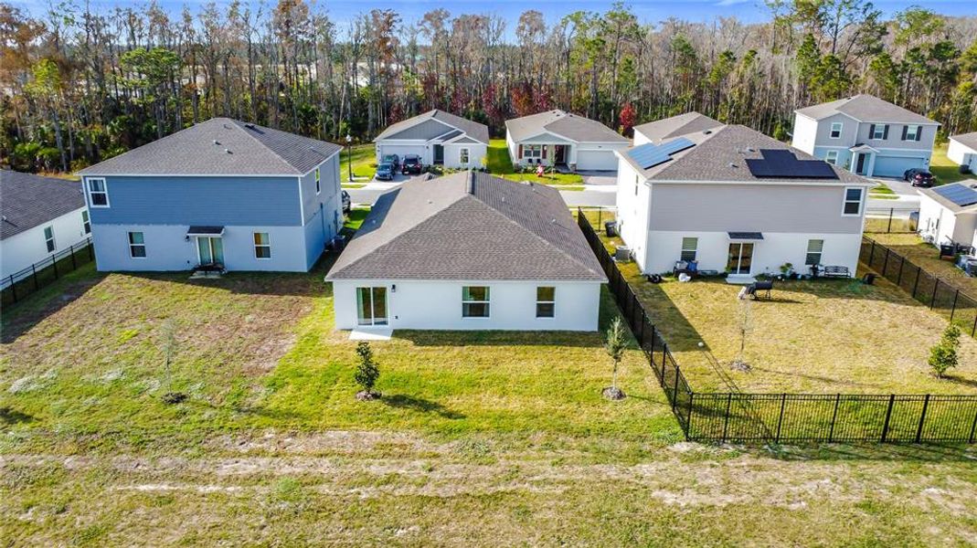 Front exterior of a new home in Providence, Davenport, FL, highlighting curb appeal (Image 26).