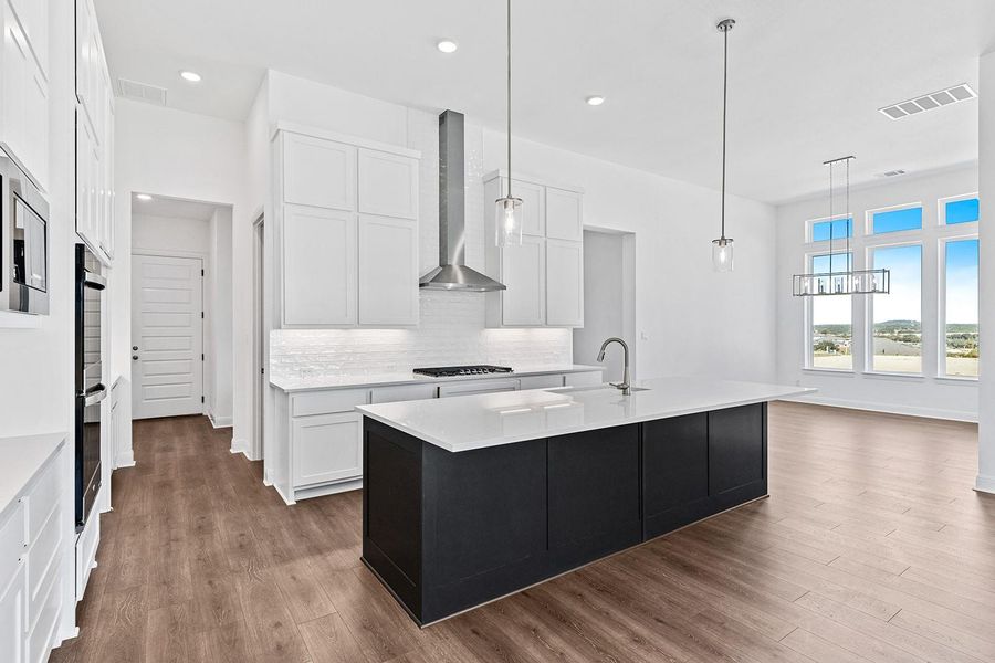 Furnished interior view inside a new home in Lariat - 70', Liberty Hill (Image 6).