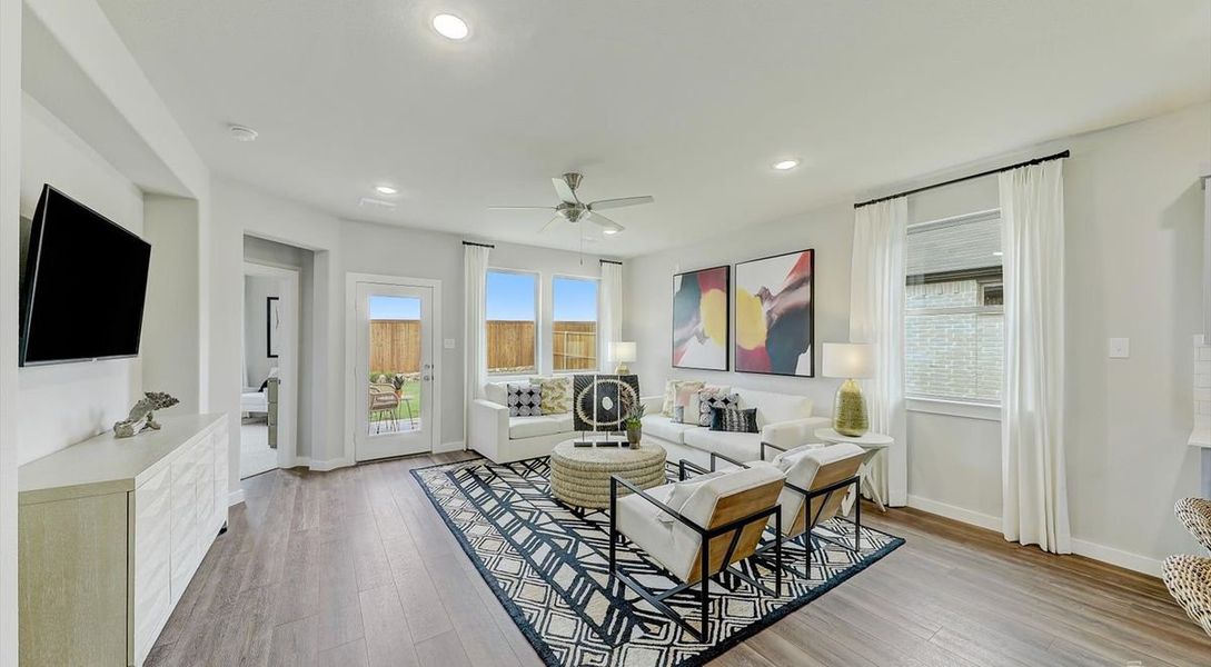 Living room in the Oak home plan by Trophy Signature Homes – REPRESENTATIVE PHOTO