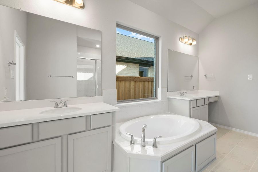 Furnished interior view inside a new home in Dunham Pointe 50', Cypress (Image 8).