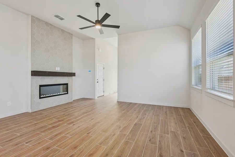 Representative unfurnished interior of a home built from the Rhyan by Chesmar Homes in Stream Waters, Seguin (Image 12).