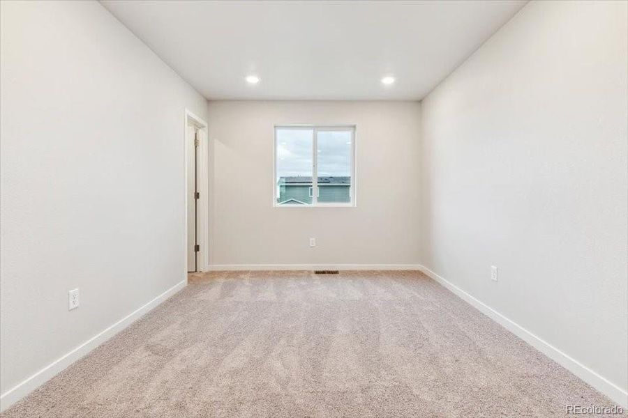 Spacious, unfurnished interior of a new home in The Haven II Collection  at Painted Prairie, Aurora (Image 20).