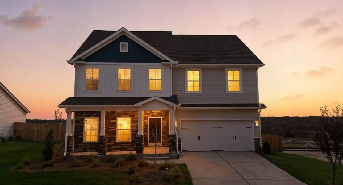 Front exterior of a new home in Miller's Reserve, Winston-Salem, NC, highlighting curb appeal (Image 2). Front exterior of a new home in Miller's Reserve, Winston-Salem, NC, highlighting curb appeal (Image 2).