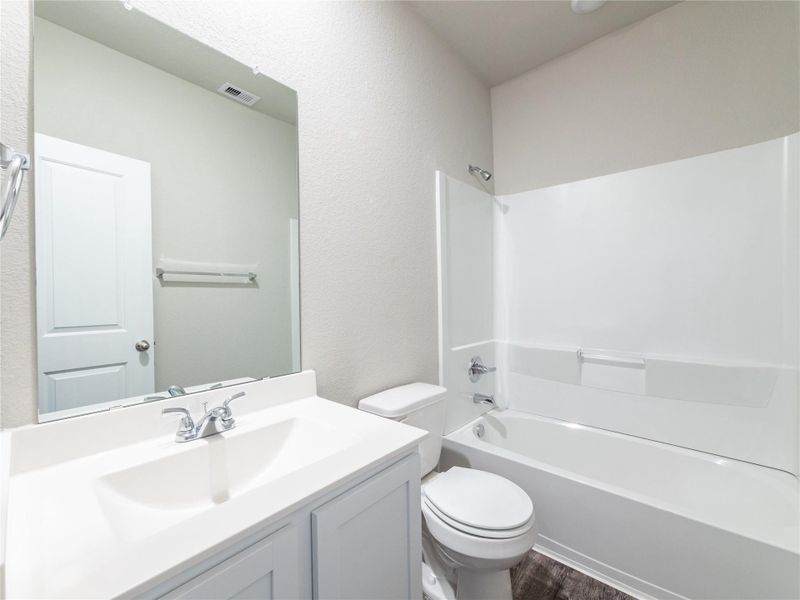 Furnished interior view inside a new home in Sweetgrass Village, Crosby (Image 3).