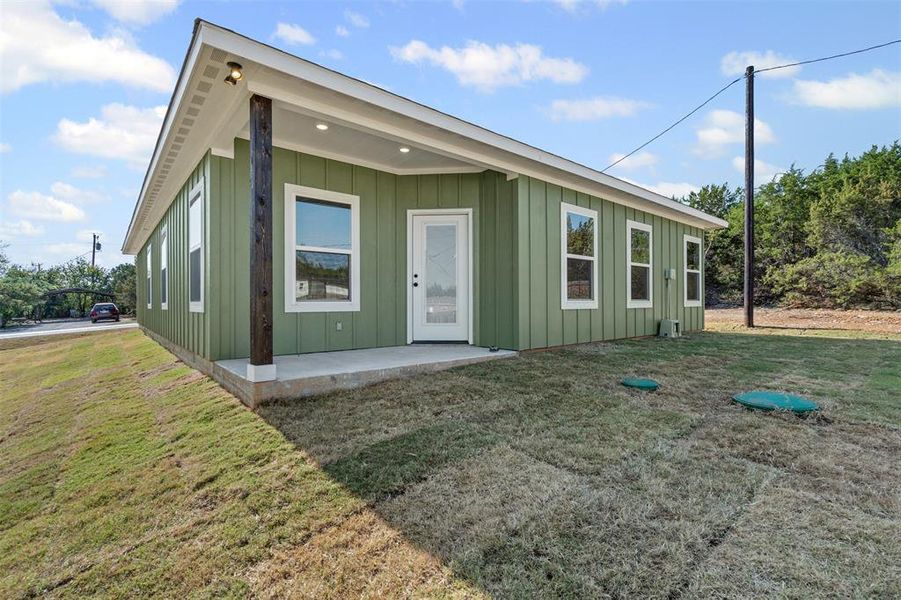 Exterior details and patio area of a home in , Granbury (Image 29).