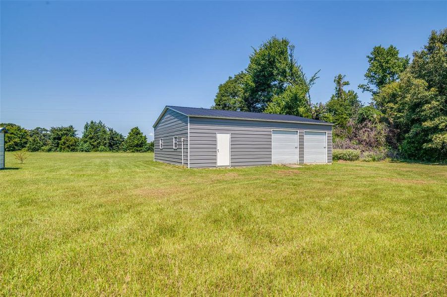 Front exterior of a new home in , Grand Saline, TX, highlighting curb appeal (Image 21). Front exterior of a new home in , Grand Saline, TX, highlighting curb appeal (Image 21).