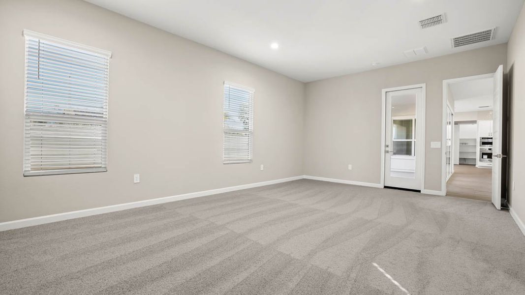 Spacious, unfurnished interior of a new home in Zanjero Pass, Waddell (Image 41).