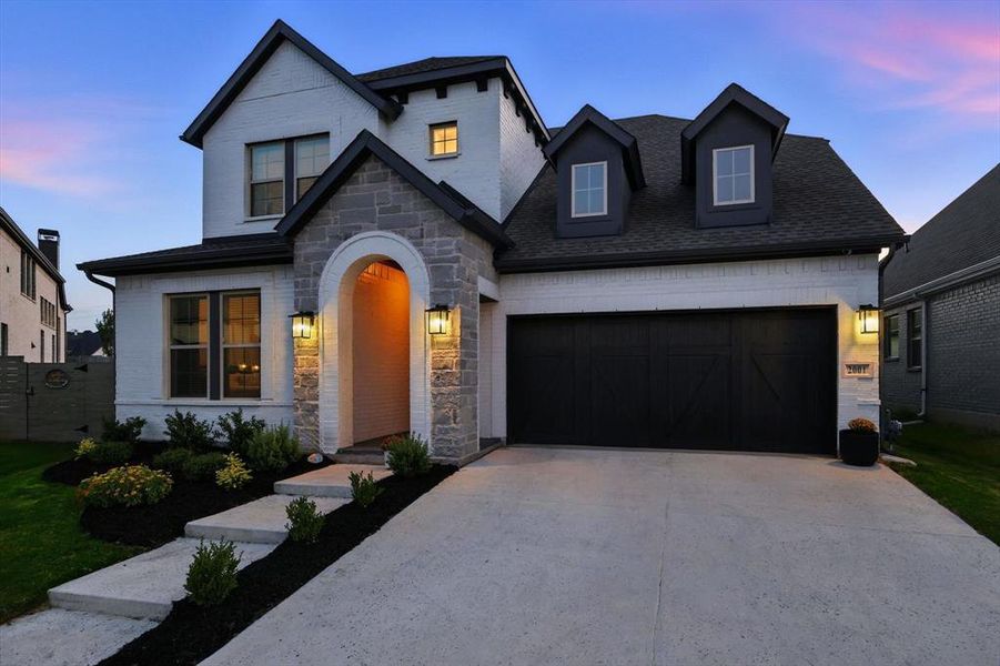 Front exterior of a new home in , Argyle, TX, highlighting curb appeal (Image 1). Front exterior of a new home in , Argyle, TX, highlighting curb appeal (Image 1).