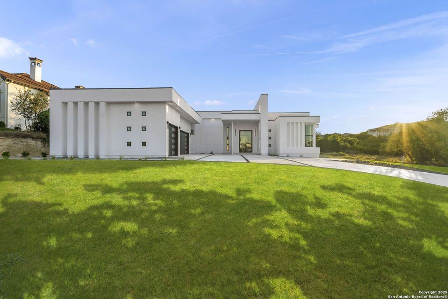 Front exterior of a new home in , San Antonio, TX, highlighting curb appeal (Image 26). Front exterior of a new home in , San Antonio, TX, highlighting curb appeal (Image 26).