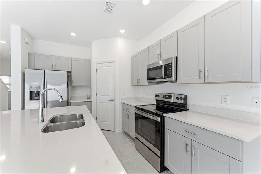 Furnished interior view inside a new home in , Kissimmee (Image 5).