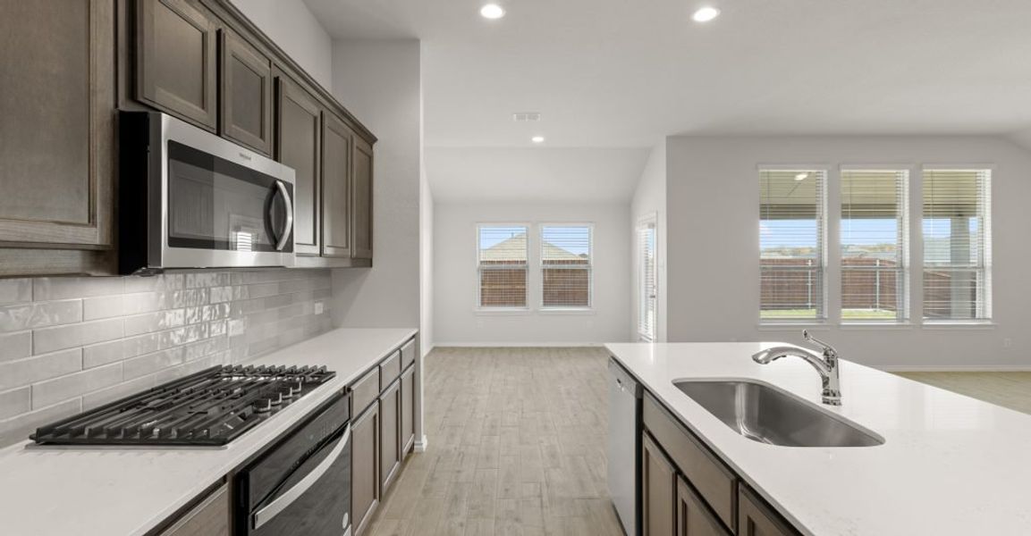 Representative exterior photo of a completed home built from the Hampton II by Impression Homes in Stone Eagle, Azle, TX (Image 7). Representative exterior photo of a completed home built from the Hampton II by Impression Homes in Stone Eagle, Azle, TX (Image 7).