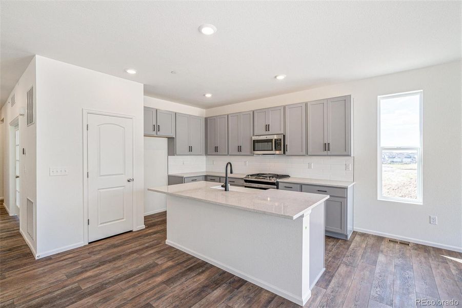 Furnished interior view inside a new home in Turnberry, Commerce City (Image 5).
